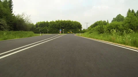 Actioncam: driving through a green area Stock Footage 24691878