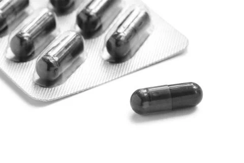 Activated carbon capsules Stock Photos