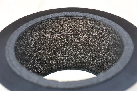 Activated carbon filter layer from an air purifier filter replacement part Stock Photos