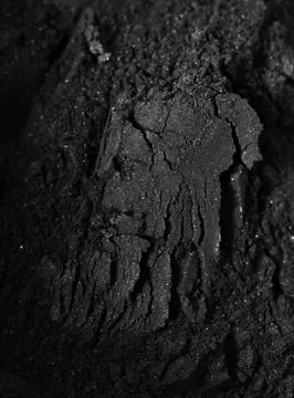 Activated charcoal powder Stock Photos