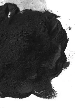 Activated charcoal powder Stock Photos