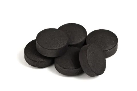 Activated coal on the isolated background Stock Photos