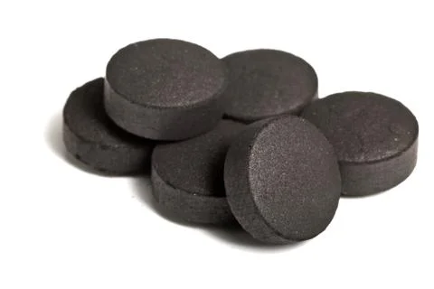 Activated coal on the isolated background Photos
