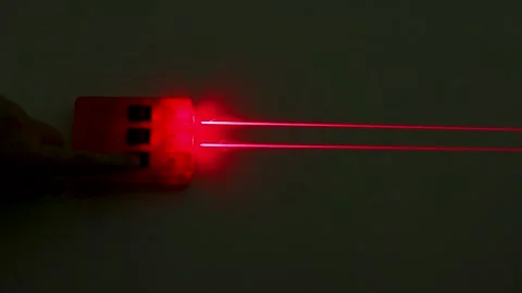 Activating Multiple Red Laser Beams in Physics Optics Experiment Stock Footage 347110408