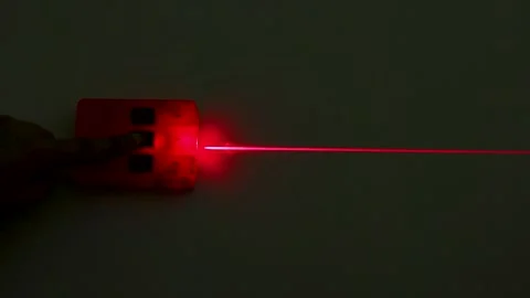 Activating a Red Laser Beam Module in Scientific Physics Experiment Stock Footage 347191905