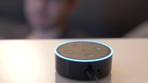 Activating a Smart Home Assistant Speaker By Voice Amazon Echo Dot Video stock 100926215