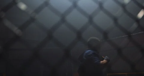 Active boxer practicing in boxing ring Video stock 108550222