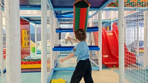 An active child develops in a children's center Video stock 332639464