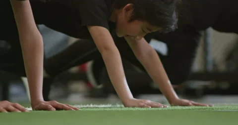 Active Chinese children having exercise class in gym,4K Stock Footage 156586516