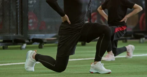 Active Chinese children having exercise class with their coach in gym,4K Stock Footage 156592712