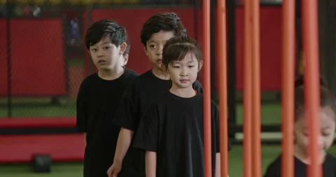 Active Chinese children having exercise class in gym,4K Stock Footage 156625015