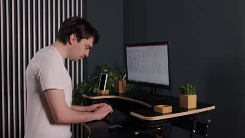 Active computer, standing position, office man Stock Footage 297183224