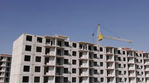 Active construction site. Building of a complex of residential buildings Stock Footage 163038743