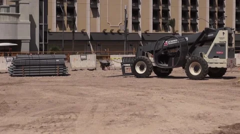 Active Construction site with Construction Workers in the Background Stock Footage 40214847