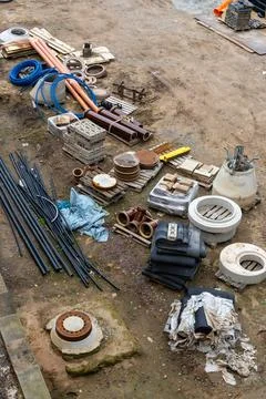 Active construction site featuring engineering equipment, building material.. Stock-Fotos
