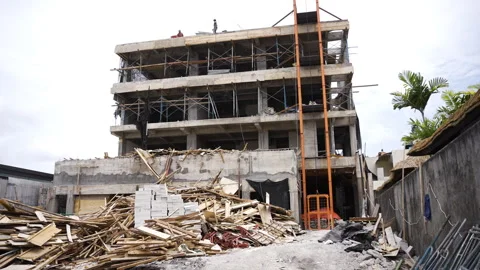 Active construction site of a multi-story building with workers. Stock Footage 271470829