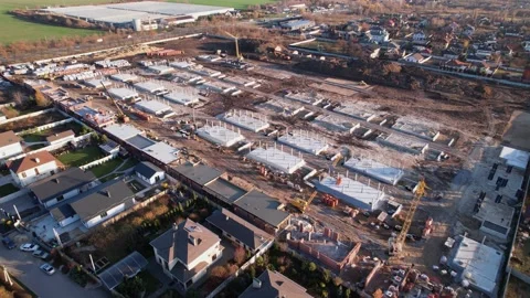Active construction of a suburban cottage town view from a drone Video stock 174809723