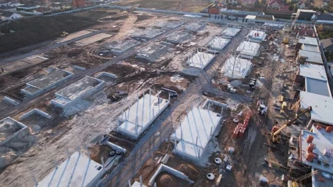Active construction of a suburban cottage town view from a drone Stock Footage 174810043