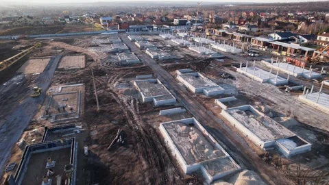 Active construction of a suburban cottage town view from a drone Video stock 174810081