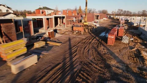 Active construction of a suburban cottage town view from a drone Video stock 174810522