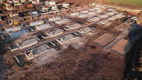 Active construction of a suburban cottage town view from a drone Video stock 174810570