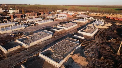 Active construction of a suburban cottage town view from a drone Video stock 174810736