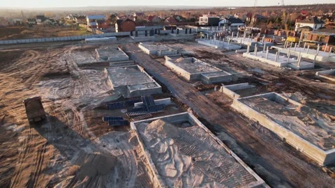 Active construction of a suburban cottage town view from a drone Video stock 174811030