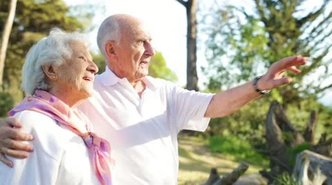 Active Elderly Couple Enjoying the Outdoors Stock Footage 21923262