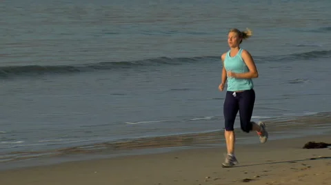 Active female on beach HD Slow motion Video stock 44619986