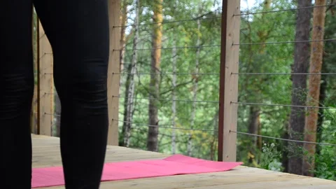 Active female  practicing meditation and yoga doing stretching exercise Stock Footage 301548642