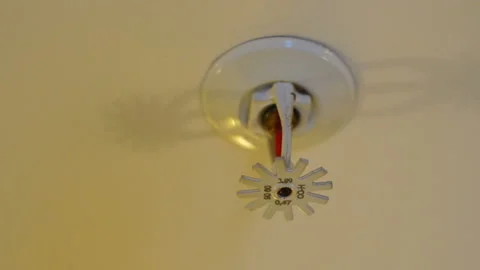Active fire protection sprinkler system. Sprinkler head on the ceiling Video stock 105669382