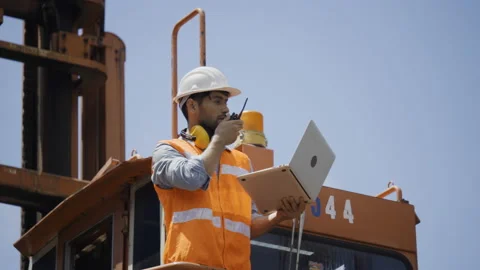 Active Foreman in Building Construction Inspection Use laptop computer to manage Stock Footage 159278593