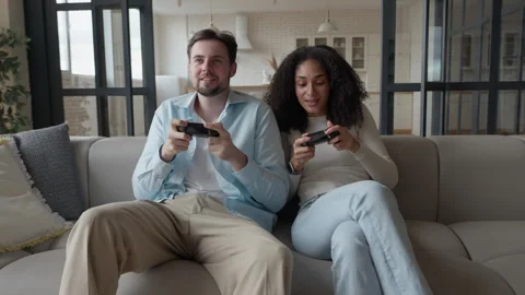 Active Friends Playing Console Game at Comfy House Stock Footage 295194470