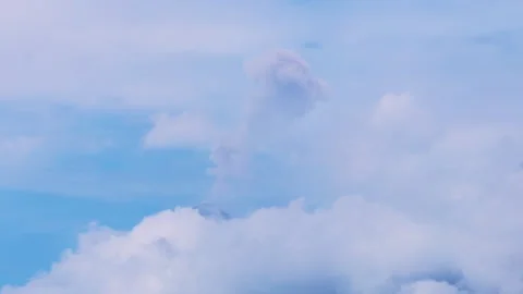 Active Fuego Volcano Erupting Through Clouds in Guatemala Central America. Stock Footage 338360562