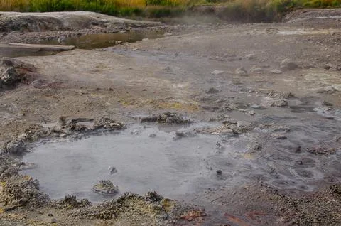 Active Geothermal Mud Pools At Dachnye Hot Springs, Kamchatka, Russia. Volcanic  Stock Photos