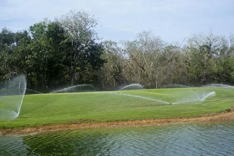 Active irrigation system in a golf course Fotos de archivo