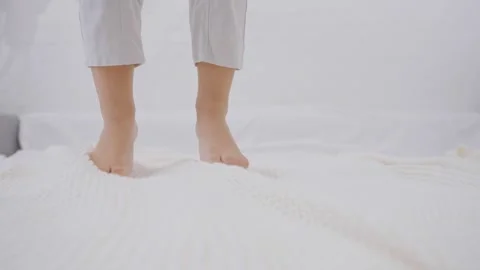 Active kid jumping on the bed Stock-Footage 244403646