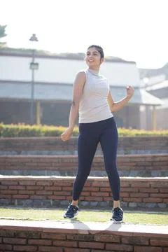 Active Lady Working Out Jogging On The Spot In The Park 스톡 사진