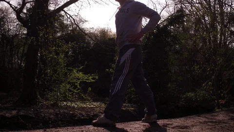 Active Lifestyle Man Jogging Resting Taking Breath Sunset Nature Summer Run Stock Footage 89686759