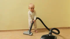 Funny little baby clean the house with v Stock Video Pond5