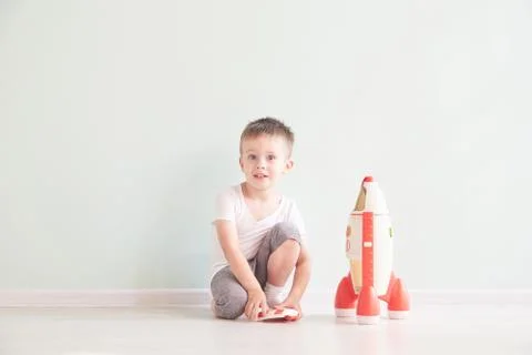 Active little boy playing the rocket toys, Child showing rocket toy with happy Stock Photos