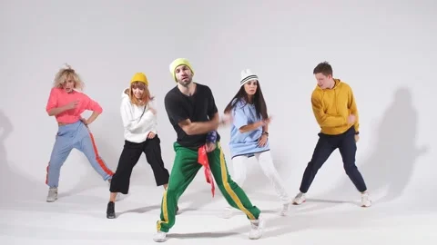 Active male dance trainer showing movie of hip hop dance Stock Footage 120943592