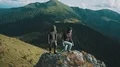 The active man and woman walking on rocks 4k or 4k+ Resolution