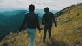 The active man and woman walking on a beautiful rocks 4k or 4k+ Resolution