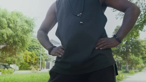 Active Man Doing Hip Circles in Local Park Stock Footage 289808699