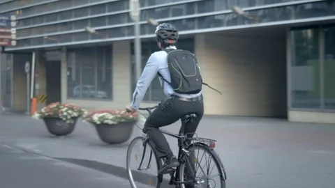 Active man on a journey to work in the business district Stock Footage 74635637