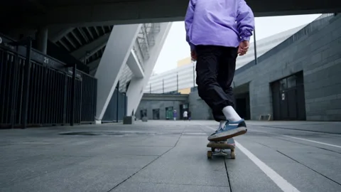 Active man making kickflip with skateboard outside. Skater riding on longboard. Stock Footage 158147166