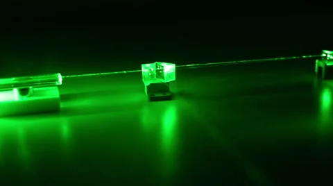 Active medium Nd:YAG. Crystal, reflector, prism, wedge, beam in a smoke. Stock Footage 57529670