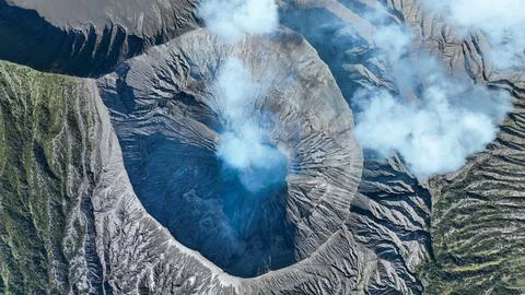 Active Mount Bromo volcano blowing smoke into the air in Java Indonesia Stock-Fotos