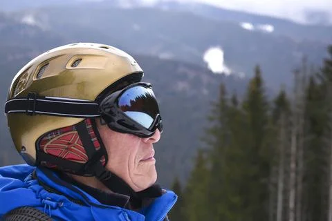 Active old aged senior experienced mature snowboarder skier man in protecti.. Stock Photos
